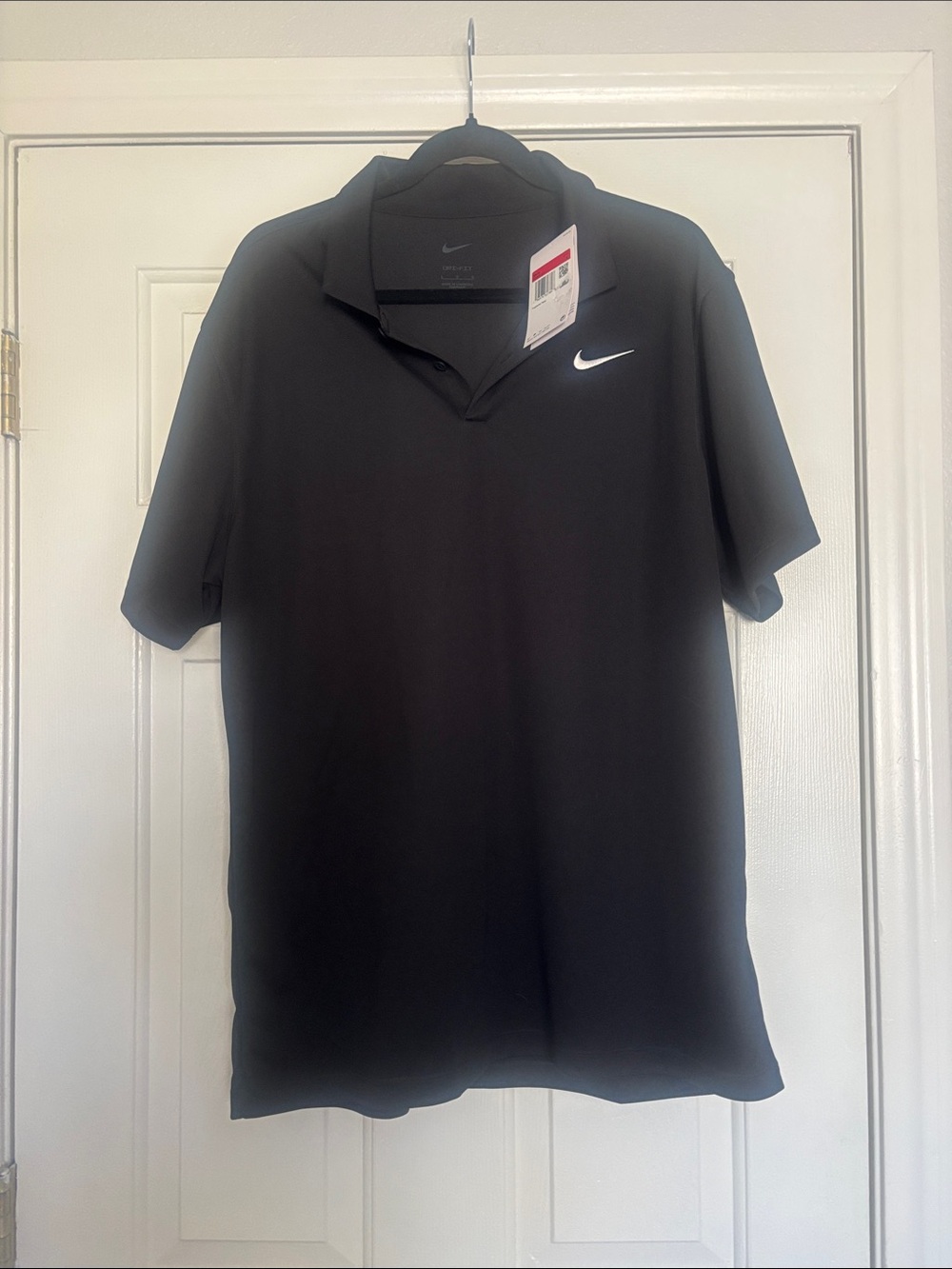 Nike DRI-FIT Men’s Black Polo with White Swoosh